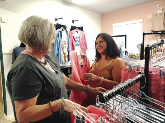 Customer Lee Klotz (left), pictured with boutique co-owner Monica Franklin, was one of the first customers in August 2023 at the store, Freedom Boutique23, located at 515 Main St. in Marble Falls.
