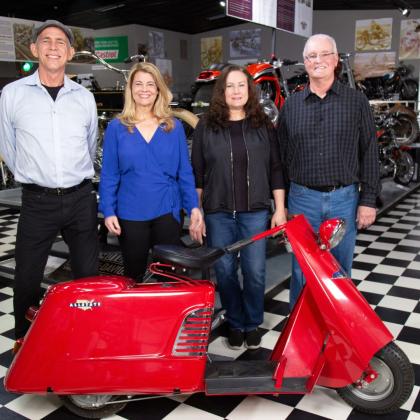 (From left) Motorcycle connoisseur Mark Scott, Lisa Whelchel, Janell Hanlon and Pat Hanlon admire the Allstate circa 1950 scooter during the production of the recent "Collector's Call" television broadcast. Contributed photo