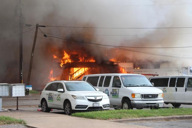 The fire either destroyed or caused considerable smoke damage to more than half a dozen businesses in the two-story strip mall.