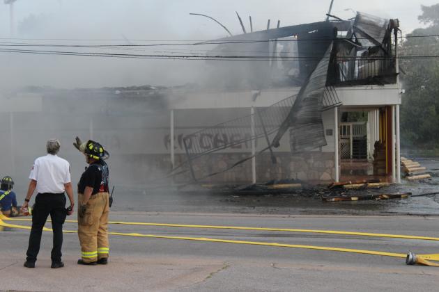 A fire engulfed a structure known as the China Kitchen building just after 6 p.m. in Marble Falls.