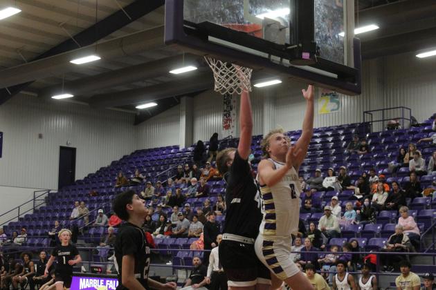 Marble Falls senior guard Davis Dreisbach is unafraid to drive to the basket and draw contact, no matter the number of fouls he receives.