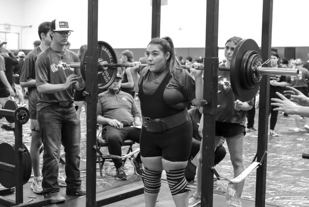 Marble Falls powerlifter Montserrat Fregoso earns a bronze medal for the Lady Mustangs.