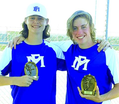Marble Falls tennis player Landon Farris (left) and Riley Stence pose with their boys doubles consolation championship trophies. Contributed photo