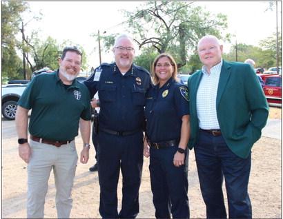 Community leaders, police and fire chiefs as well as Rotarians attended the 9/11 memorial ceremony in Johnson Park on Sept. 11. Pictured, from left, are First Responder Chaplain John Brantley of St. Andrew Presbyterian Church; Marble Falls Police Chief Glenn Hanson; Assistant Police Chief Trisha Ratliff and Marble Falls Mayor Dave Rhodes.