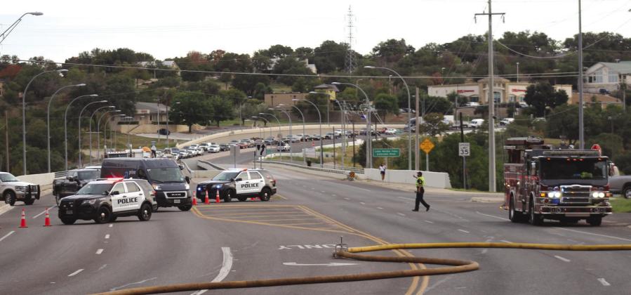 Authorities halted traffic traveling north on the Lake Marble Falls Bridge and southbound traffic around Fourth Street on US 281 Oct. 4, due to number of first responder vehicles, equipment and resources needed to battle the blaze. Connie Swinney/The Highlander