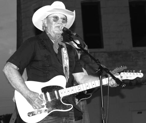 Gary P. Nunn played under the stars June 17 in Burnet along the Burnet County Courthouse a south side during the “Jackson Street Jam” attended by hundreds. Photos by Raymon V. Whelan/The Highlander