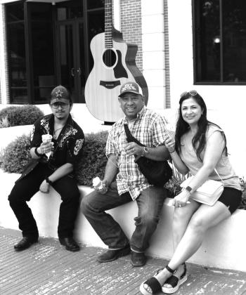 Locals as well as visitors enjoyed the “Jackson Street Jam” June 17 along the Burnet County Courthouse south side including (from left) Rick, Frank and Eva Rios from Premont.