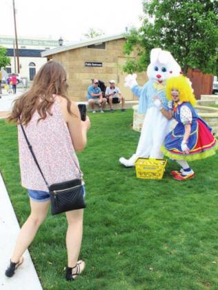 Ms. Lollipop and the Easter bunny directed youngsters as they joined the 2022 Egg Scavenger Hunt in downtown Marble Falls on Good Friday.