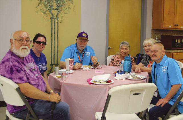 Marble Falls Senior Activity Center members and guests (from left) Sebastian Midolo, Stacie Midolo, Bob Quigley (president), Geneva Hopkins, Jody Cook, Ronald DeLancey enjoyed a break during the Health Fair Oct. 6.