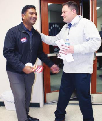Right: US Congressional primary candidate Abhiram Garapati mingled and met Burnet County court-at-law primary candidate Cody Henson during the GOP county judge candidate forum Jan. 11.