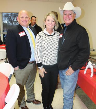 Attendees of the Burnet County Republican Club meeting on Tuesday, Jan. 11 included County Court-at-Law candidate Angela Dowdle and Terry Kennedy (left); Pct. 2 County Commissioner Damon Beierle and Pct. 4 Commissioner Joe Don Dockery with wife Midge, Marble Falls EDC Business Development Coordinator (above); and County Court-at-Law candidate Cody Henson with wife Susan (right). Photos by Connie Swinney/The Highlander