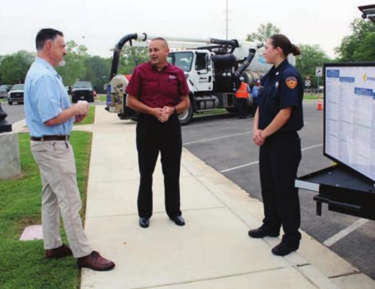 Right: (From left) Marble Falls Finance Director Jeff Lazenby, Marble Falls Fire Chief Russell Sander and firefighter Bailee Jordan were among city staff who talked resources with council members on May 11 at Lakeside Pavilion.