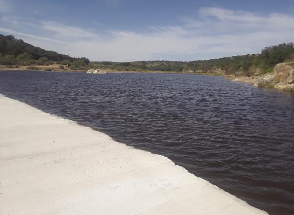 A private dam on the James River, which feeds into the Llano River, held back thousands of gallons of runoff recently, during rain late September and early October. The state recently ordered the owner to remove it due to lack of a permit application. Contributed photo