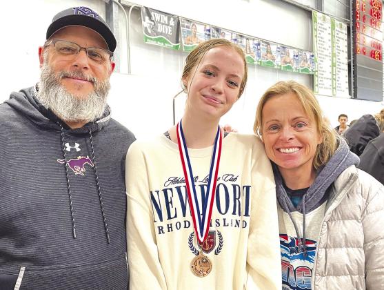 Marble Falls freshman swimmer Kealin Alford (center) with swimming head coach Jamie Graham (left) and her mother, Elizabeth Coyle.