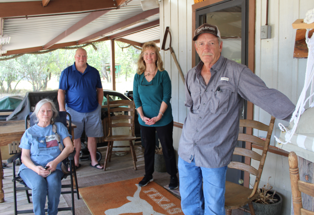 After about four months of operation, a group of Eagle Bluff residents have banned together to oppose the establishment of a shortterm rental home in their neighborhood. Pictured are: residents Scott Johnson (in back), Johnny Burkett, Kathy Bellamy and Sarah Byars (seated).
