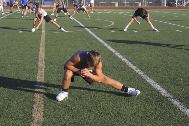 Preparations for competition take center stage in high school training, such as this 2018 Mustang football camp. UIL mandated that athlete participation clearance - once tested positive for COVID-19 - should be authorized by the individual athlete's physician. File photo
