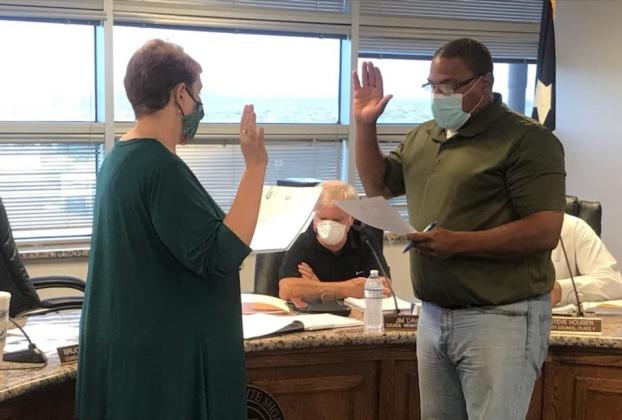 Granite Shoasl Councilman Will Skinner takes the Oath of Office to become mayor Oct. 13 from City Secretary Elaine Simpson.