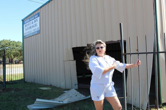 Pat Heinecke of Hers and His Investments storage facility in Kingsland is offering a reward for information that leads to the arrest of a suspect(s) who drove off after causing damage to her business. Connie Swinney/The Highlander