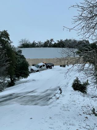 A utility vehicle contracting with Pedernales Electric Cooperative could not navigate the icy conditions and left the roadway on Clayton Nolen Drive in Horseshoe Bay.