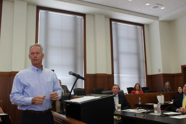 Marble Falls businessman Mark McDonald told Burnet County Commissioners that proposed “legislation that is currently in D.C. has pulled the brakes off of everything” in regard to securing gun rights. Photos by Lew K. Cohn