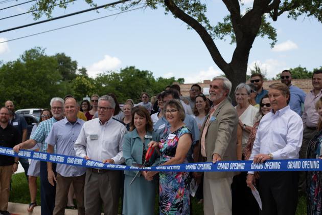 On May 25 ignitaries from the Community Resource Center, Texas Housing Foundation and chambers of commerce in Marble Falls and Burnet conducted a ribbon cutting ceremony May 25 to welcome the community to the newly-renovated facility. Contributed photos/Mary Jo Callaway