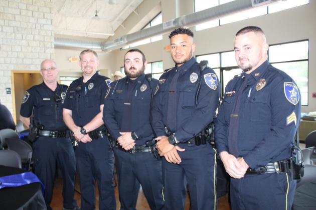Attendees at the retirement party included MFPD peace officers. Pictured are, from left, Officer Ricky Greer, Officer Hunter Gally, Officer Lukas DeHart, Officer David Jackson and Sergeant Barry Greer.
