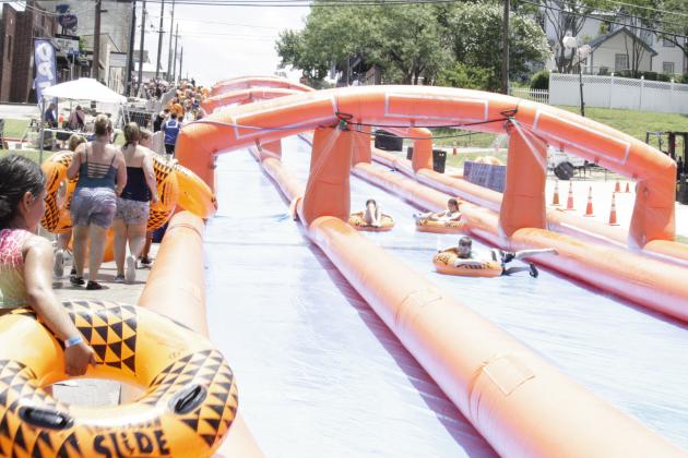 The downtown water slide event down Third Street in Marble Falls is an amenity, sponsored by the Marble Falls/Lake LBJ Chamber of Commerce and Ms. Lollipop’s Parties Fun & Gifts. It's happening Saturday and Sunday, June 19-20. 