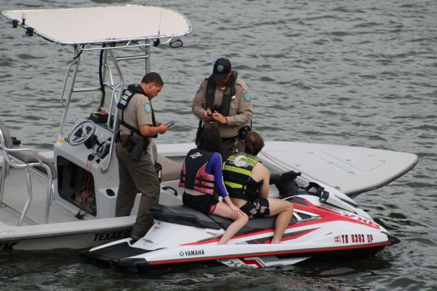 Texas Parks and Wildlife game wardens had a busy Independence Day weekend, patroling Lake LBJ. Nathan Hendrix/The Highlander