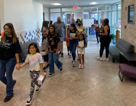 Families can be seen here at Highland Lakes Elementary School in Granite Shoals Aug. 16 meeting their teachers. COVID-19 cases among staff led to a two-day campus closure starting Aug. 25 and sanitation of the campus. Contributed/HLES PTO