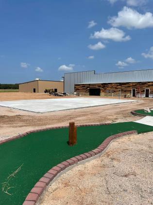 Outdoor venues will include a miniature golf course and live music area.