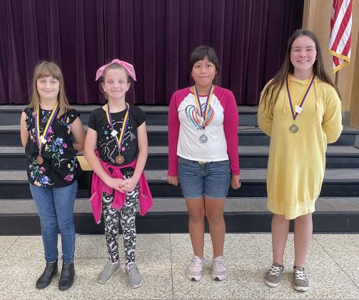 Contributed/MFISD Vivienne Mykolaitis, of Spicewood Elementary, (right) finished in first in the fifth grade dictionary skills competition on Saturday. Jessica Rodriquez, of Colt Elemtentary, finished second; and Gracey Moffett and Addisyn Schaefer, both of Colt Elementary, tied for third.