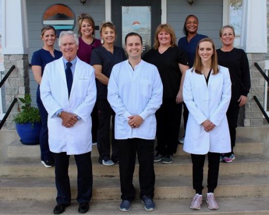 Seven Lakes Dental is, front row, from left: Dr. Milton Phair, DDS; Dr. Joshua White, DDS; and Dr. Anne Shedlosky, DDS; back row, from left: Laura Eckert, RDH; Beverly Walker; Tina Thomas, RDH; Peggy Puryear; Leslie Neely; and Emily Greiner, RDH. Contributed