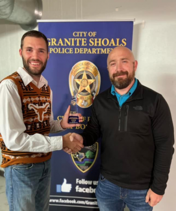 Officer Raleigh Gosdin was named officer of the year for the Granite Shoals Police Department by Chief Gary Boshears. Photos contributed/GSPD