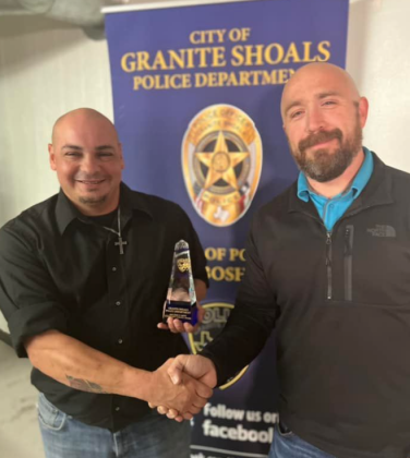 Animal Control Officer Rey Salinas received the community service award for his participation in events and involvement at Highland Lakes Elementary School.