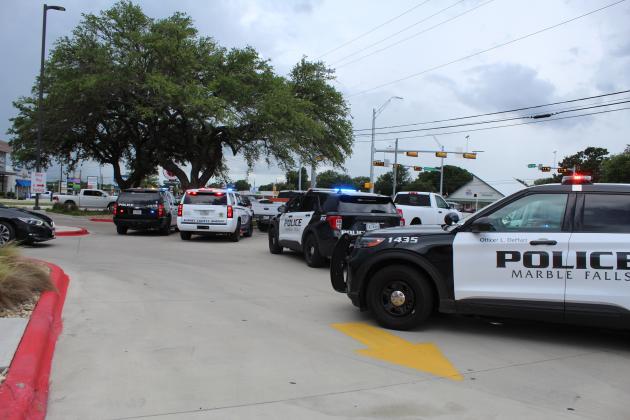 Above: In June 2021, motorists could see swift response from several law enforcement responding to a call of a public disturbance in an eatery parking lot in Marble Falls, where funding support for agencies grows each year. Larger municipalities, such as the size of Austin, will face re-allocation of state funds, in effect January of this year, if they choose to move money away from their central police entities without a ballot measure. File photos