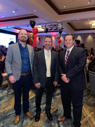 Taylor Smith, past president; Chamber CEO/President Jarrod Metzgar; and Jordan Tatsch encouraged a picture-perfect moment that captured the mood of the evening Feb. 17 during the Marble Falls/Lake LBJ Chamber of Commerce 2022 Awards Banquet.