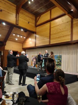 Burnet County Commissioner Damon Beierle received a warm reception after earning the first David Kithil Service Award at the event at the Cedar Skies venue at Log Country Cove. Contributed photos