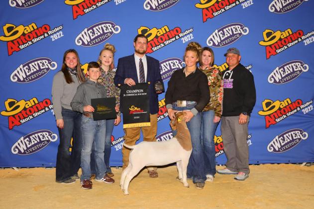 McKenzie Evans earned overall Grand Champion Doe. She is pictured at the San Antonio Stock Show and Rodeo in February with family and friends and show judge Jake Warntjes as well as in the arena with other competitors.
