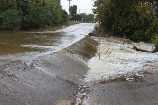 Motorists may soon see enhanced warning systems at low-water crossings in the city as personnel receives the green light to carry out the requirements of a FEMA grant. File photo