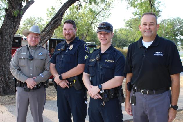 Members of the community attended the 2023 9/11 ceremony held in Johnson Park Sept. 11 in support of area first responders. Pictured, from left, are Texas DPS Trooper Frank Randolph, Marble Falls Police Sgt. Matt Horner, MFPD Animal Control Officer Nate Harrell and Marble Falls Assistant City Manager Russell Sander.