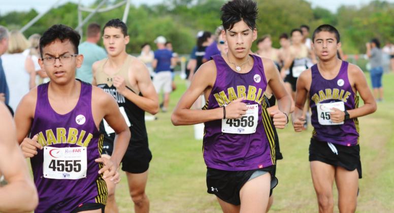 Contributed/Chris Schrader Maco Almazan, Baylor Chavez and Ezekiel Atkinson stayed together on the updated Marble Falls High School cross country course. Almazan and Atkinson finished within 40 seconds of each other in the top 10 in the JV race.