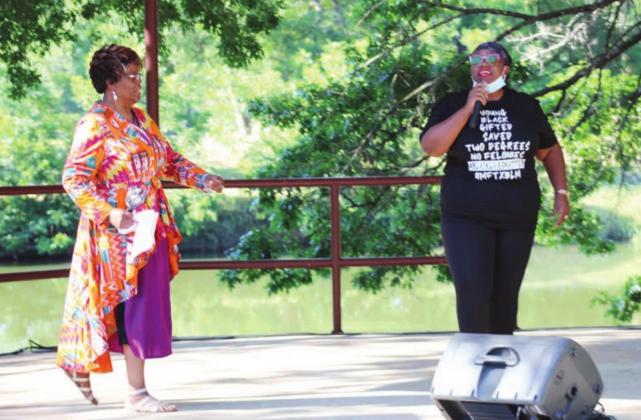 Above: A series of speakers, including faith-based community leaders spoke at the Black Lives Matter protest on Saturday at the pavilion stage adjacent to Backbone Creek in Johnson Park. Pictured are long-time resident Bessie Jackson (left) and Monique Breaux, who assisted a group of high school graduates with organizing the protest.
