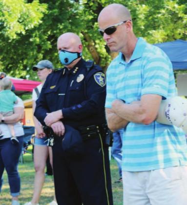 Left: Marble Falls Police Chief Mark Whitacre and Marble Falls ISD Superintendent Chris Allen attended the protest and march June 13 in Marble Falls.