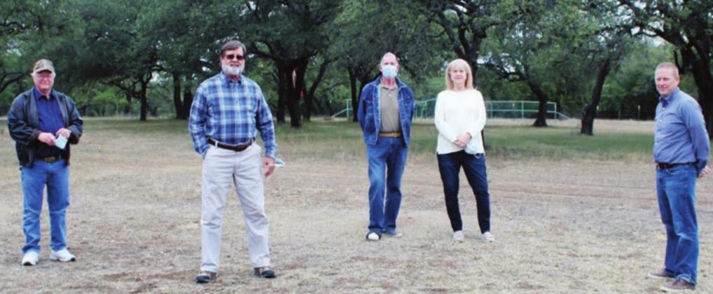 Residents in and near CR 403 in Burnet County announced Dec. 2 that they had joined forces to oppose a planned RV park. Pictured, from left are: Mark Parker, Kent Leighton, Ed and Jeannie Cook and Brent Chittenden. Connie Swinney/The Highlander