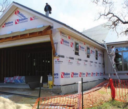 A number of buyers are snatching up homes quickly which are then being renovated or refurbished to suit the needs of the new homeowners. Pictured here is L&amp;R Roofing on March 23 in the 500 block of Firedance in Horseshoe Bay.