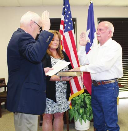 Llano County Judge Ron Cunningham swore in Gary Silver as the new Pct. 1 Llano County Constable on Sept. 1. Silver’s wife Sam assisted with the ceremony and also pinned on his badge. Connie Swinney/The Highlander
