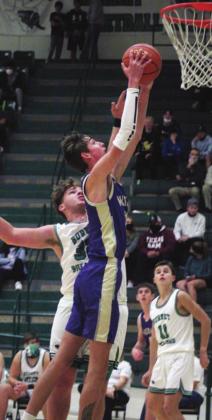 Mustangs senior Kason O’Riley is tough to defend in the paint due to his long arms and elite vertical. The Burnet gameplan against him involved using heavier players to push him around. Nathan Hendrix/The Highlander