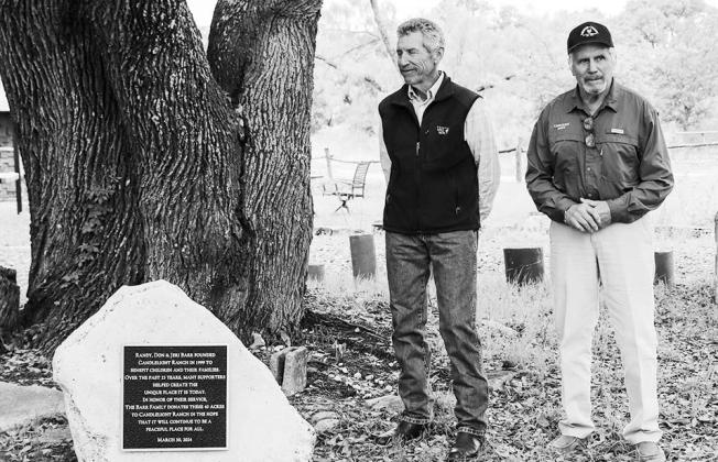 Don and Randy Barr stood beside the plaque honoring their 40-acre donation to Candlelight Ranch Saturday, March 30. The Barrs founded Candlelight Ranch in 1999. Photos by Martelle Luedecke/Luedecke Photography
