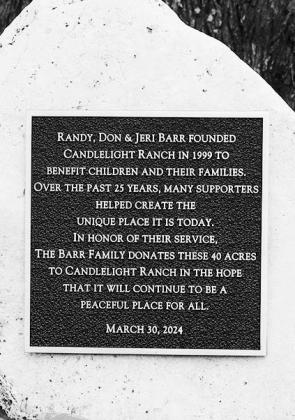 The dedication plaque for the Barr family 40-acre donation to Candlelight Ranch was recognized Saturday, March 30 during the dedication ceremony. Randy, Don, and Jeri Barr founded Candlelight Ranch, east of Marble Falls, in 1999 to benefit children and their families.
