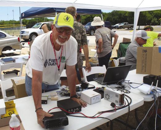 The Highland Lakes Amateur Radio Club, with member Tom Hauer pictured here, hosted a field day last year on the grounds of the YMCA in Burnet. This year, their event will be at Inks Lake State Park. File photo